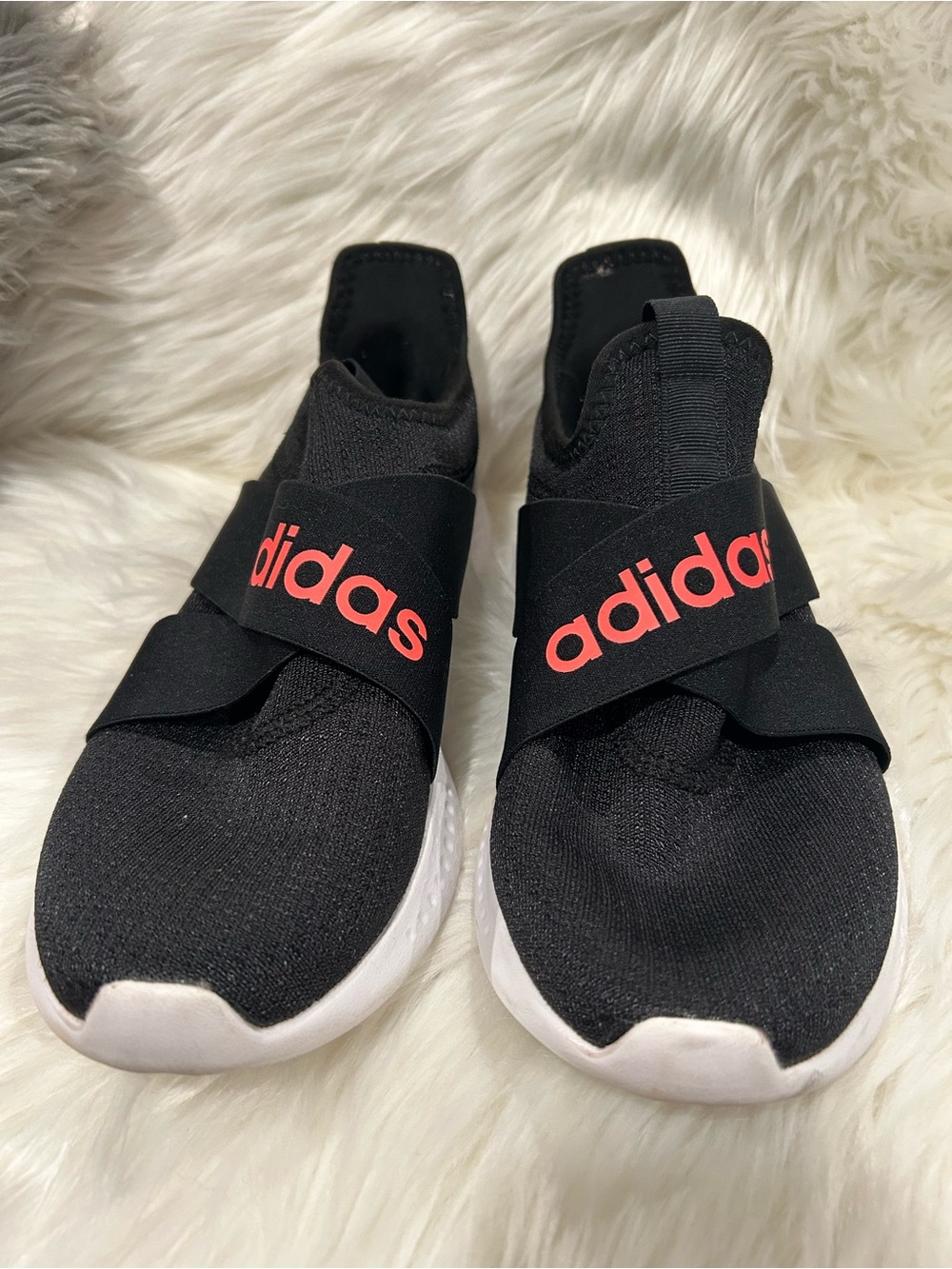 adidas Women’s Black Slip-On Sneakers with Coral Logo